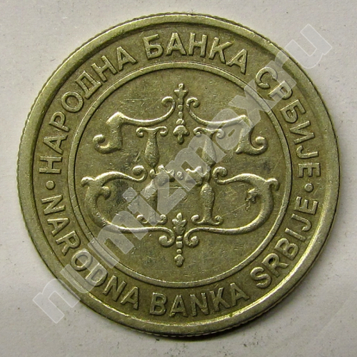 Монета: 10 динаров 2003 г. (аверс)